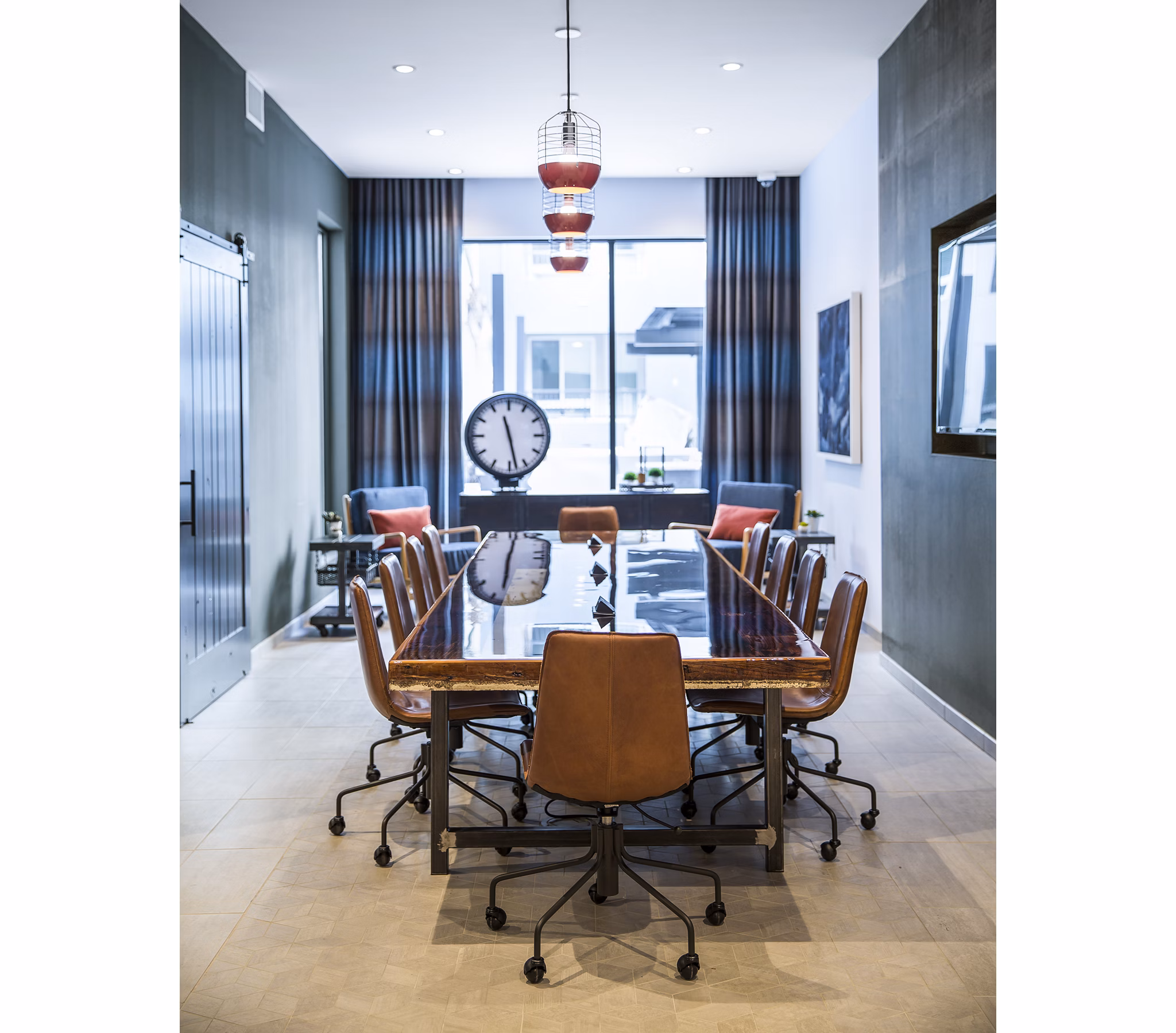 The Griffith Apartments: Modern meeting facility with sleek design and ample seating in a luxury setting
