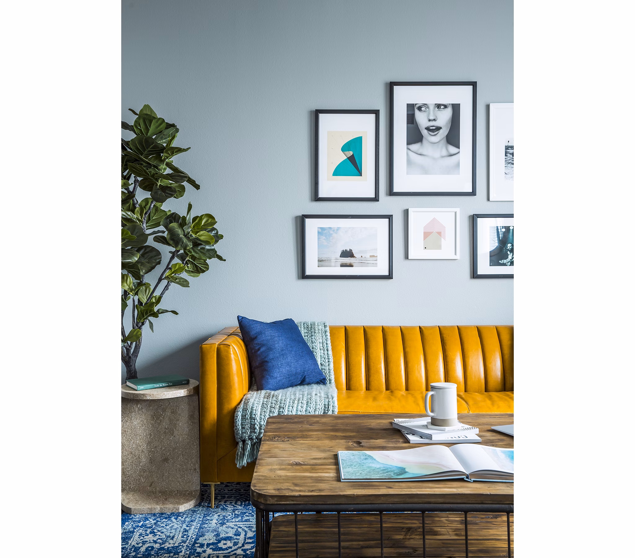 Modern living room with sleek furnishings and open layout at The Griffith Apartments