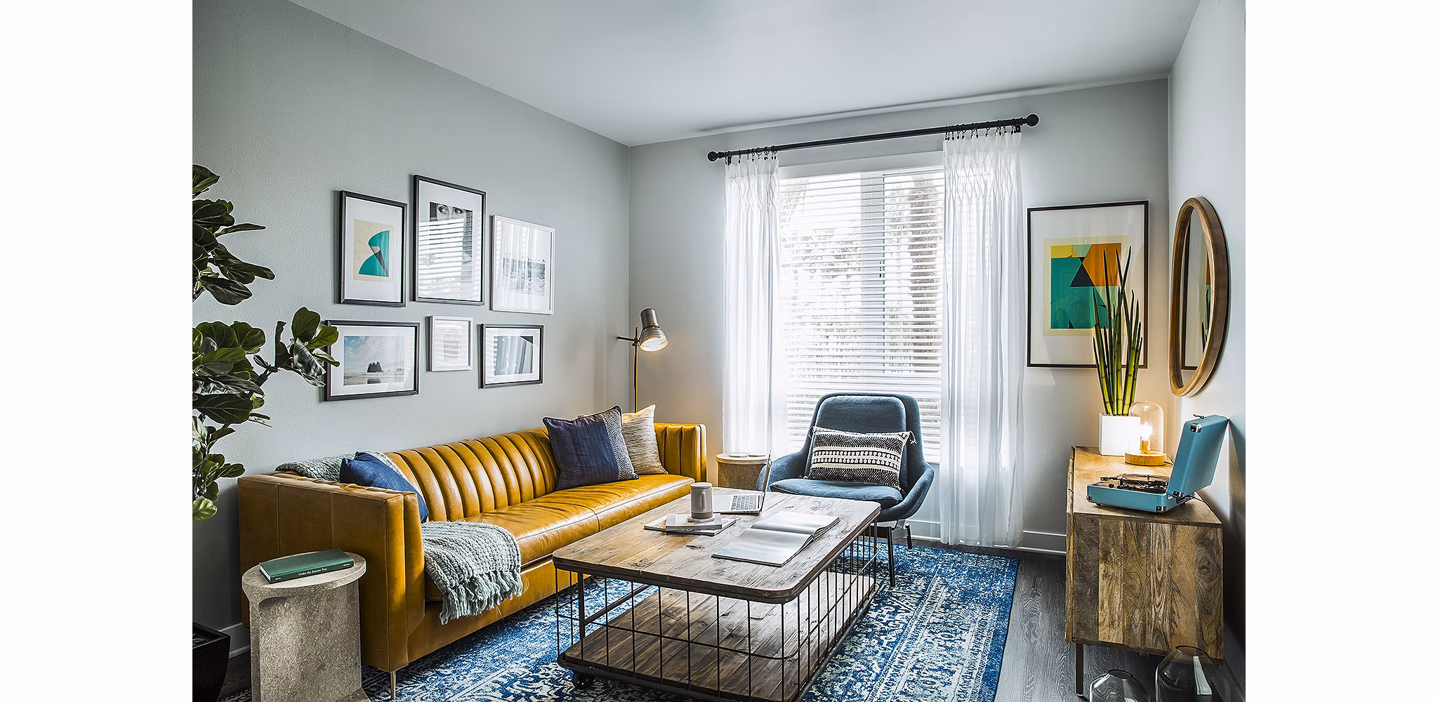 The Griffith Apartments: Modern living room with stylish furniture and natural light