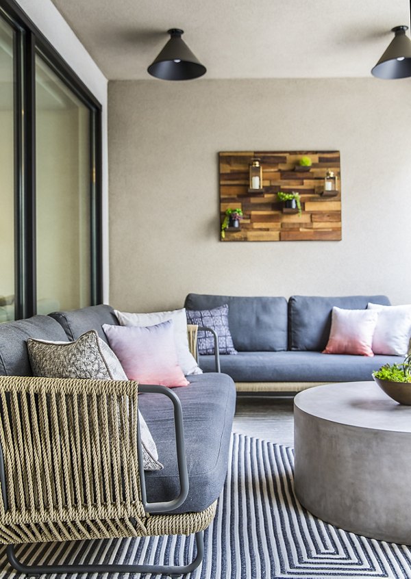 Private patio with stylish seating at The Griffith Apartments
