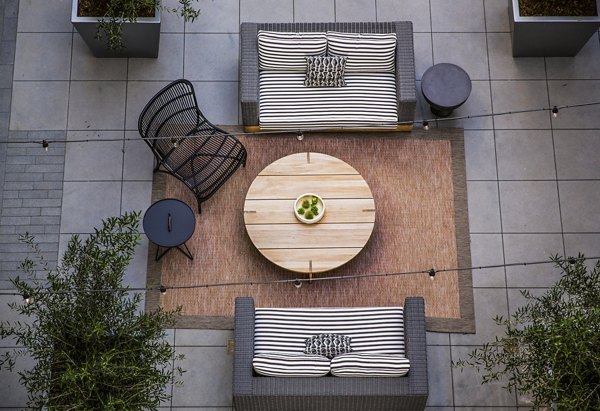 The Griffith Apartments: Tranquil courtyard with lush gardens in luxury complex
