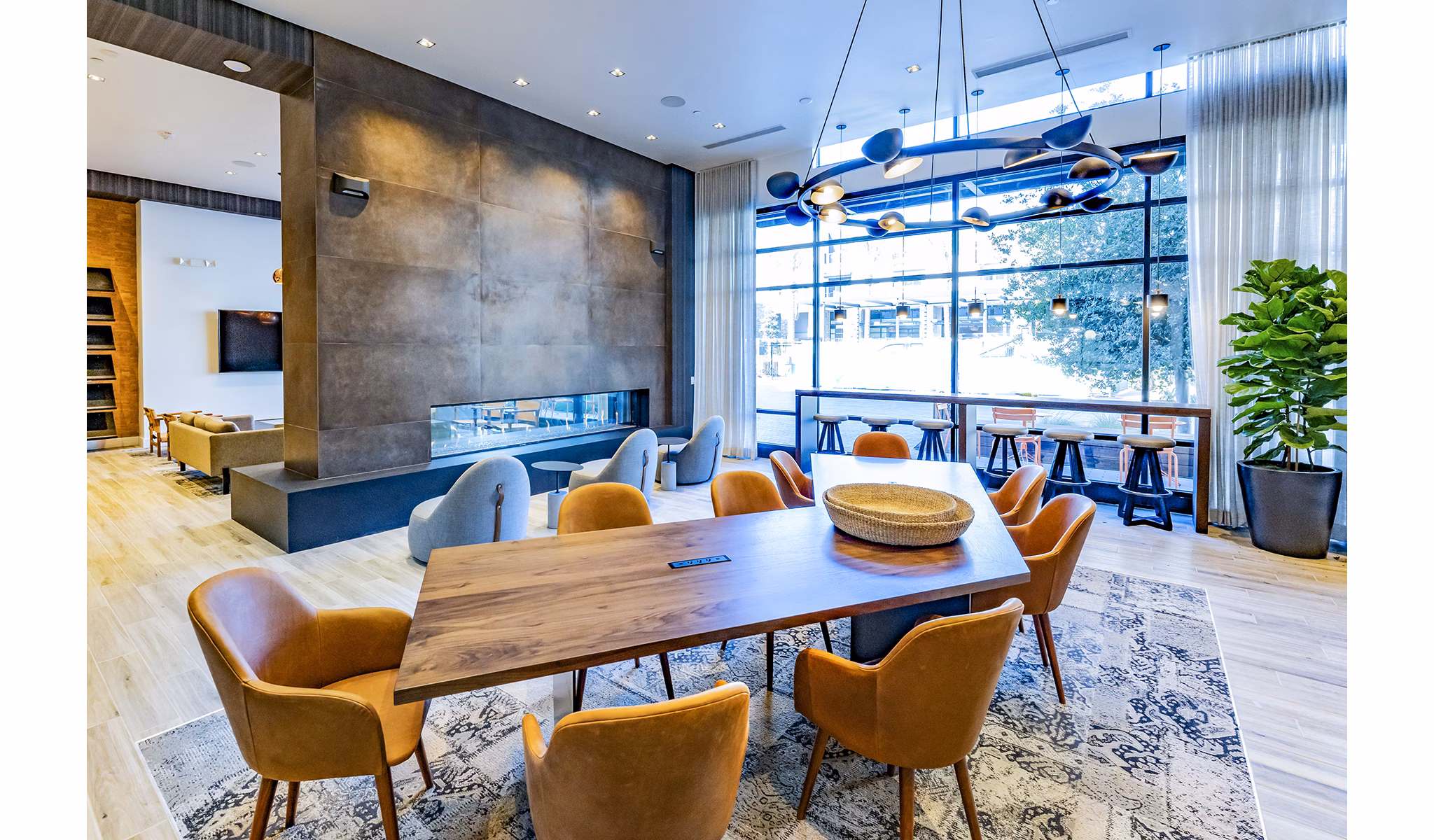 The Asher Apartments: Clubhouse lobby featuring modern design and comfortable seating
