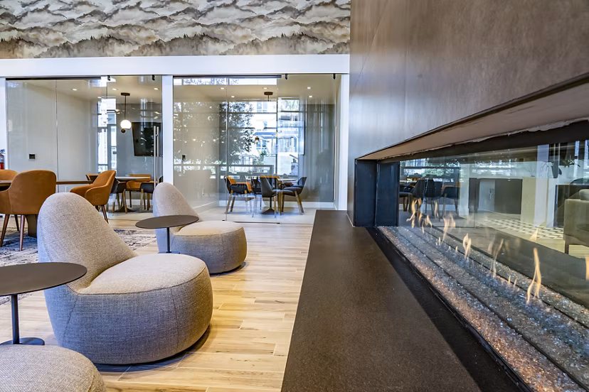 The Asher Apartments: Modern clubhouse lobby with contemporary design elements