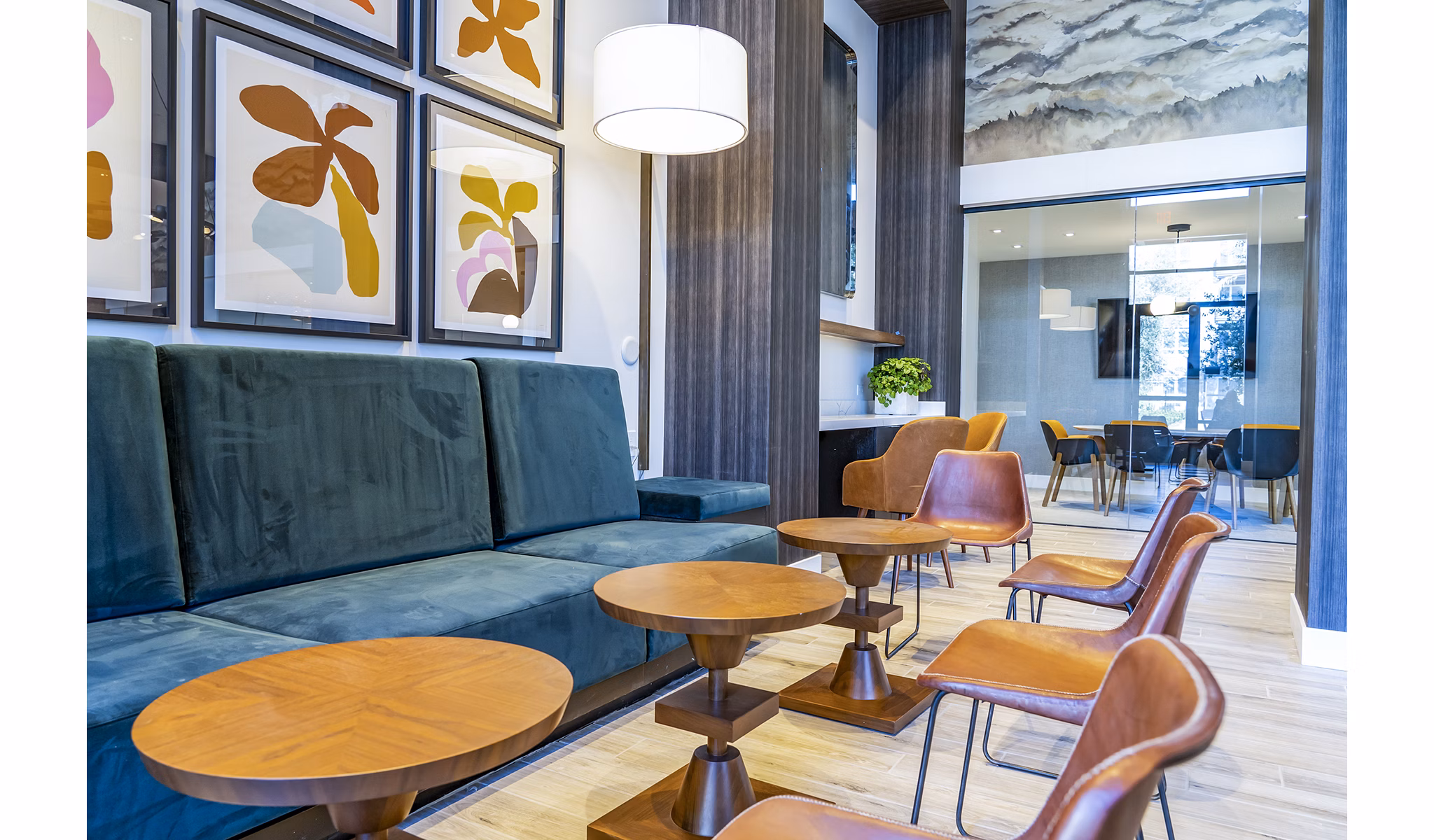 The Asher Apartments: Elegant clubhouse lobby featuring modern decor and seating areas