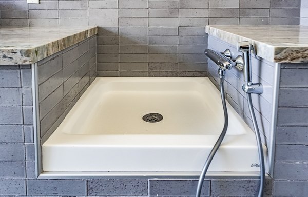 Dog wash station at The Asher Apartments with convenient facilities for pet grooming