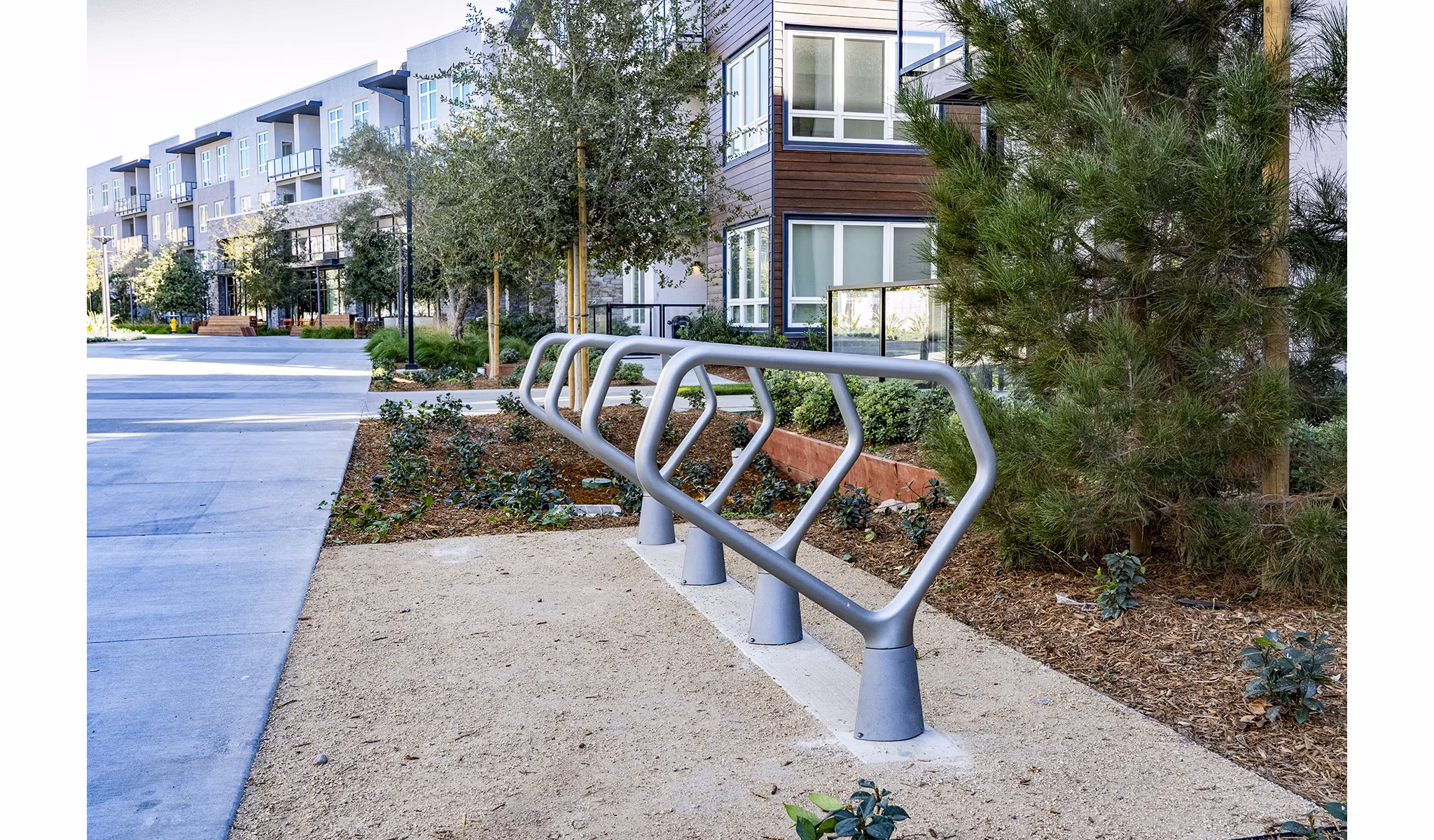 Bike storage area with secure racks at The Asher Apartments: Convenient and safe bicycle parking option for residents