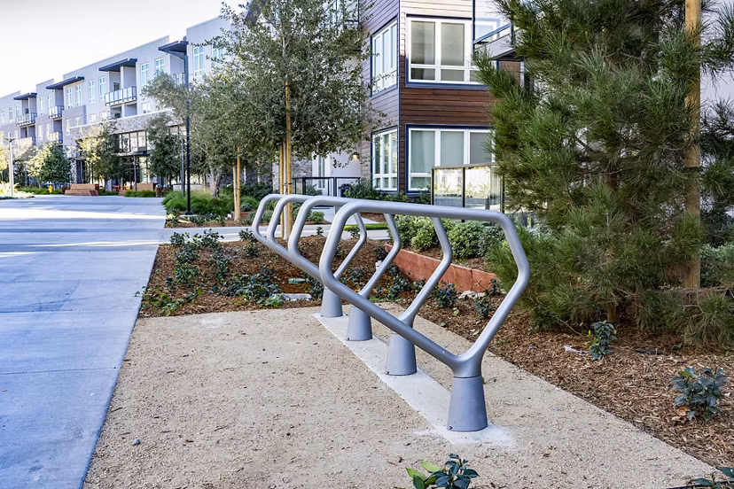 Bike storage area with secure racks at The Asher Apartments: Convenient and safe bicycle parking option for residents