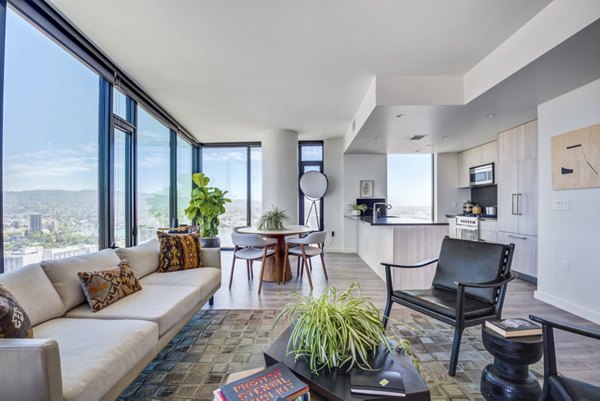 Modern living room with sleek furnishings and natural light at Atlas Apartments in downtown, offered by Greystar luxury apartments