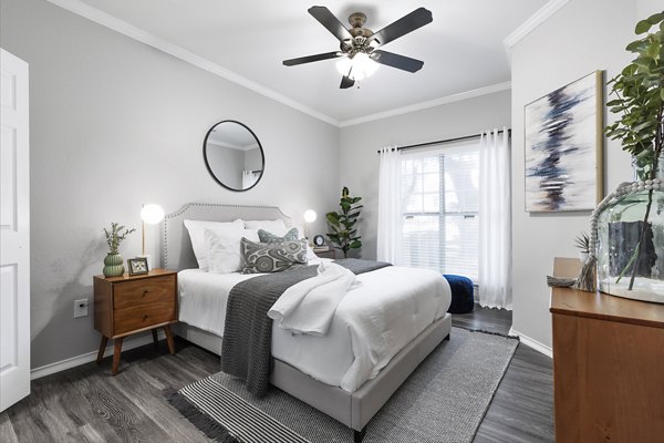 Cozy bedroom with stylish decor at Mesa Verde Apartments