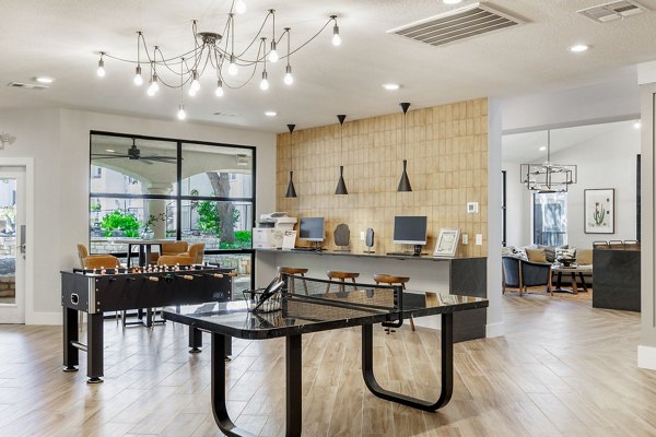 Mesa Verde Apartments: Luxury clubhouse featuring modern design and spacious seating areas