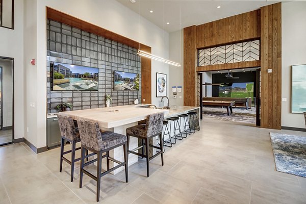 Stylish clubhouse with modern decor at Lenox Reserve Apartments, perfect for gatherings and events in a luxury setting