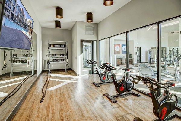 Yoga/spin studio with modern equipment at Lenox Reserve Apartments