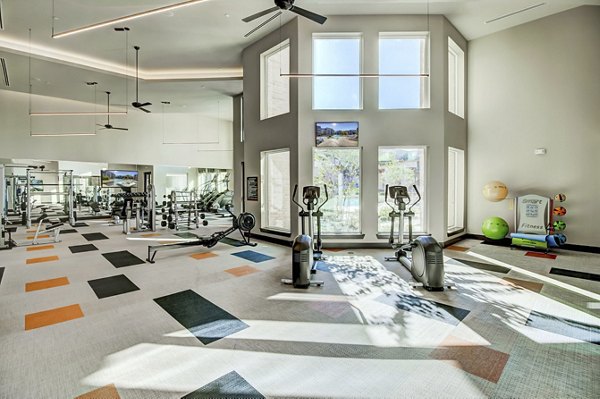 State-of-the-art fitness center at Lenox Reserve Apartments featuring modern exercise equipment and spacious workout areas