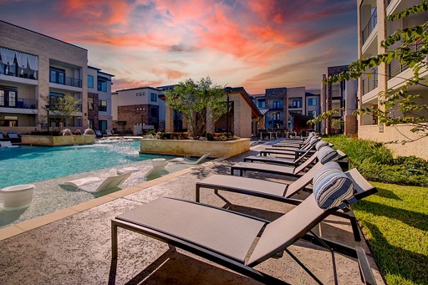 Resort-style pool at Lenox Reserve Apartments offering relaxation and leisure in a luxury setting