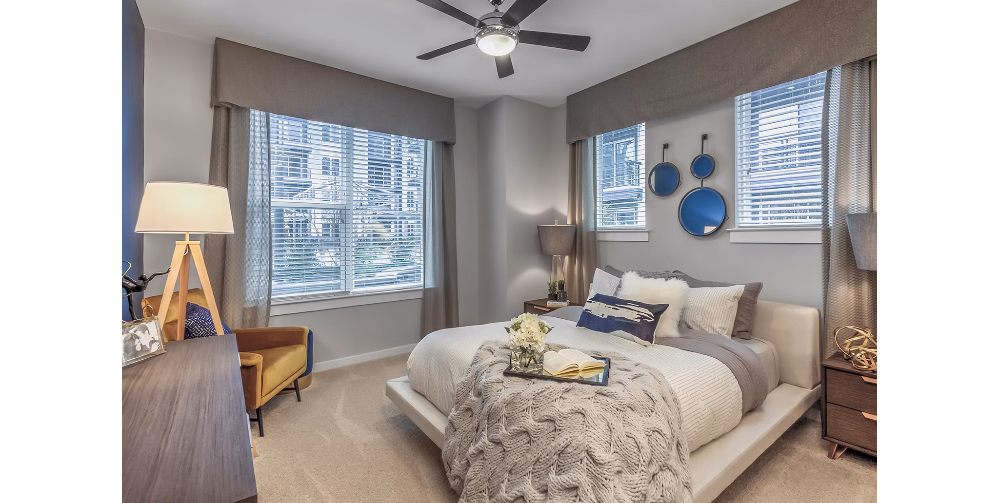 Cozy bedroom with modern decor at Bainbridge South End Apartments