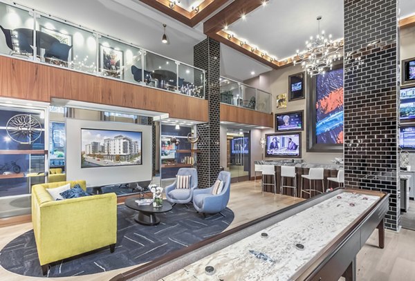 Clubhouse featuring modern design and comfortable seating at Bainbridge South End Apartments