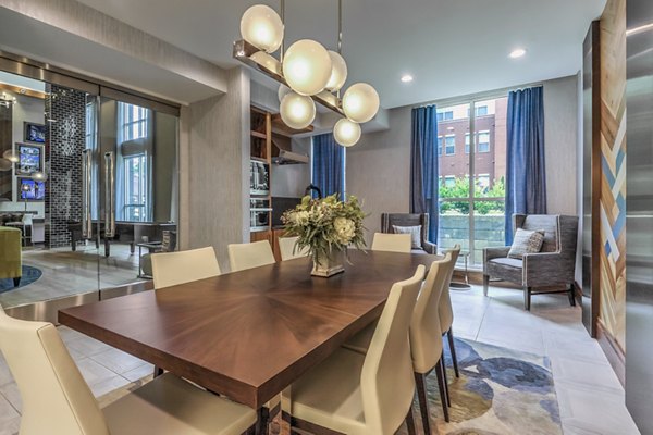 Clubhouse with modern design and seating areas at Bainbridge South End Apartments