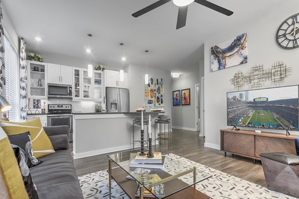 Spacious living room with modern furnishings at Bainbridge South End Apartments