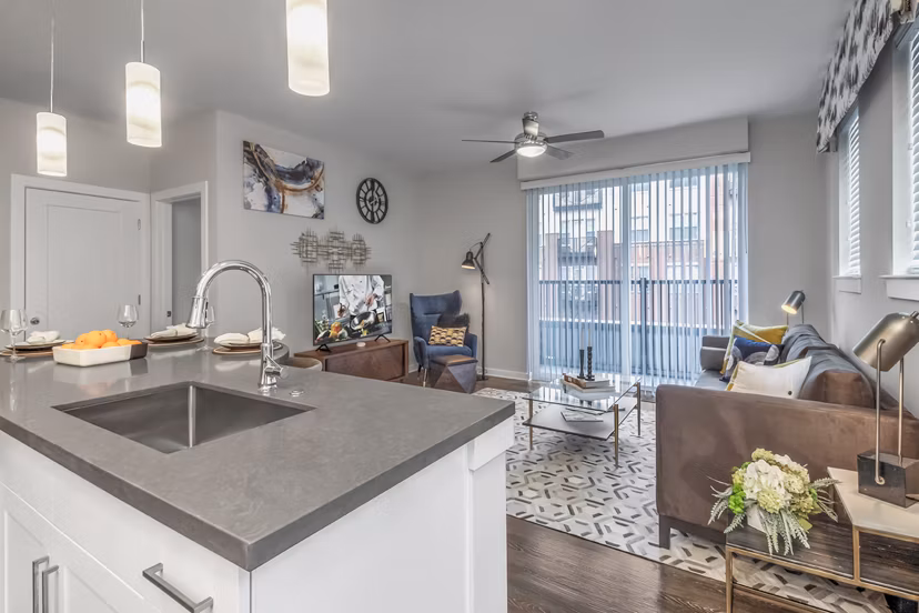 Spacious living room with stylish decor at Bainbridge South End Apartments