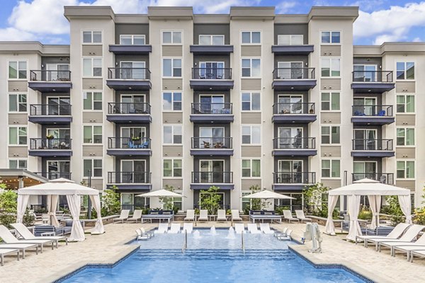 Rooftop pool with city views at Bainbridge South End Apartments, offering luxury relaxation and leisure