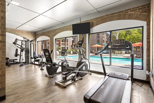 Modern fitness center with state-of-the-art equipment at The Haven Apartments