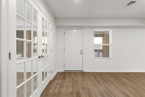 Modern kitchen with stainless steel appliances at The Haven Apartments