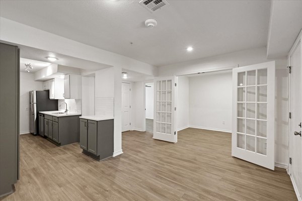 Modern kitchen with stainless steel appliances in The Haven Apartments