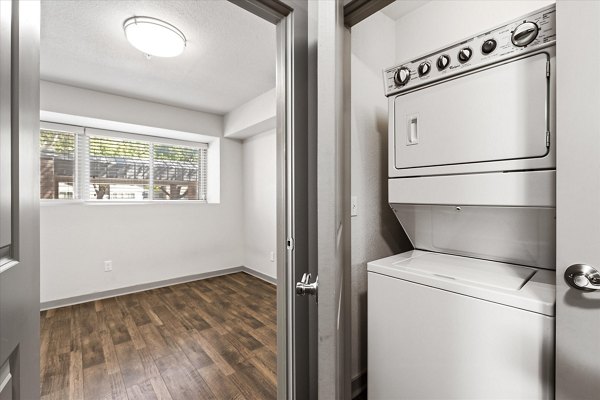 Laundry room featuring modern appliances at The Haven Apartments, Greystar's luxury apartments for convenient living