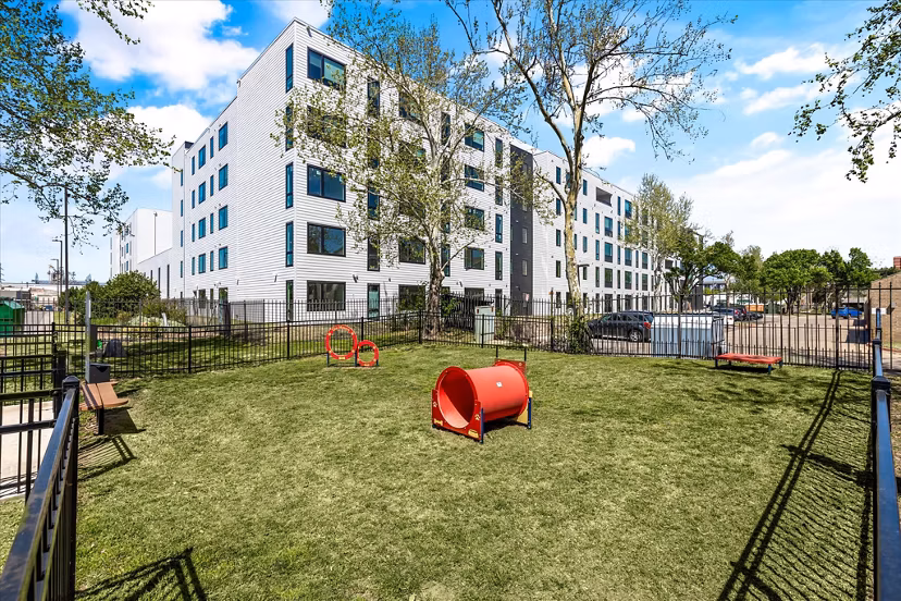 Dog park featuring agility equipment at The Haven Apartments