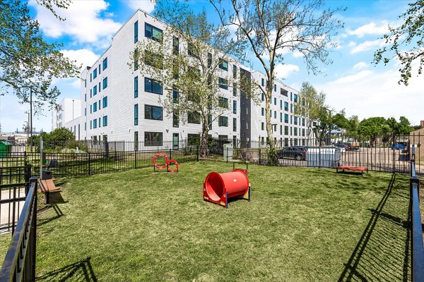 Dog park featuring agility equipment at The Haven Apartments