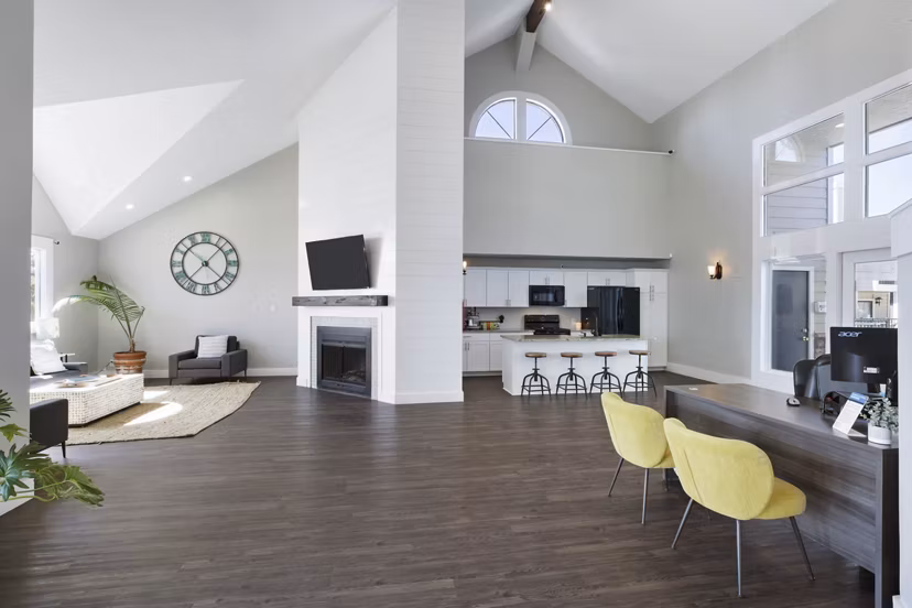 Clubhouse featuring cozy seating and modern design at Woodland Trails Apartments