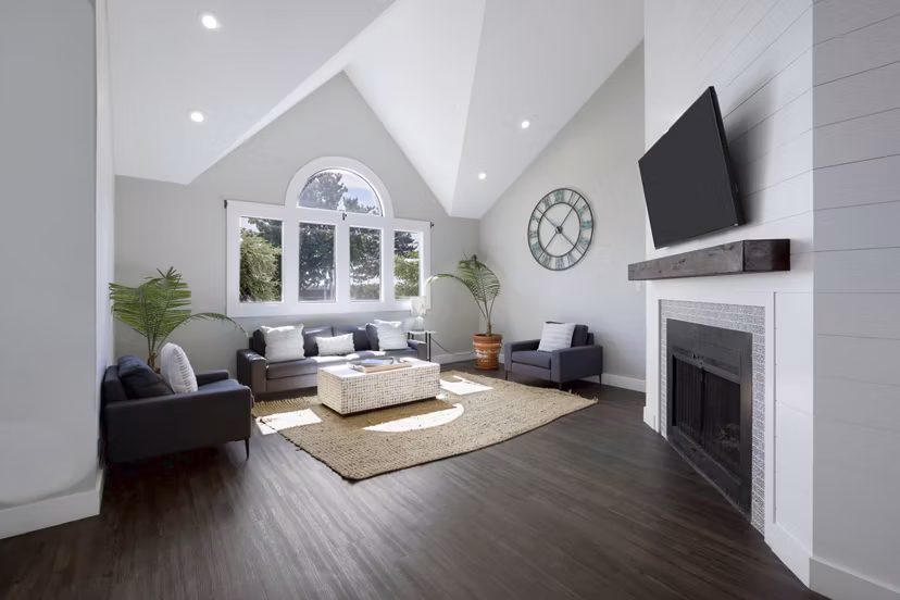 Clubhouse featuring modern design and comfortable seating at Woodland Trails Apartments