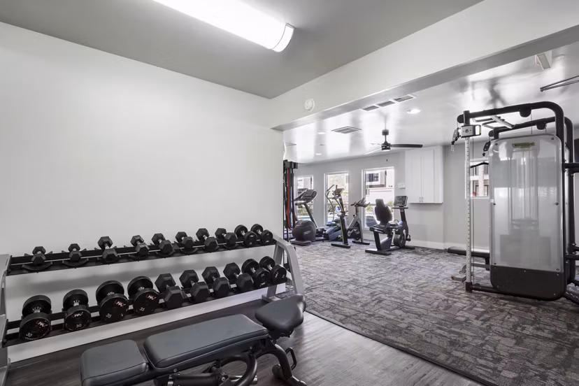 State-of-the-art fitness center with modern equipment at Woodland Trails Apartments