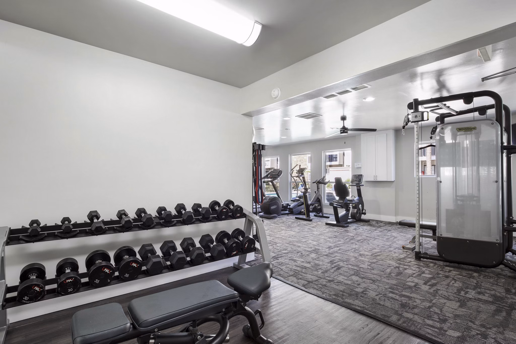 State-of-the-art fitness center with modern equipment at Woodland Trails Apartments