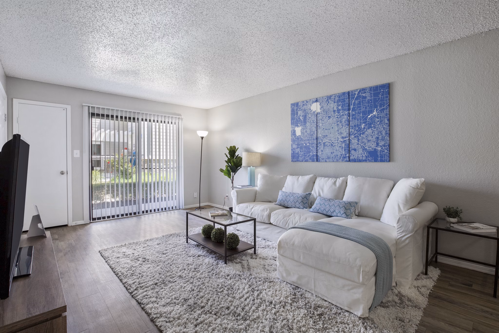 Spacious living room with modern decor at Woodland Trails Apartments