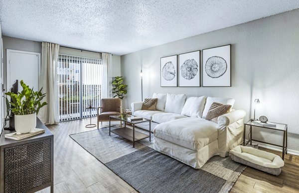 Spacious living room with modern decor at Woodland Trails Apartments