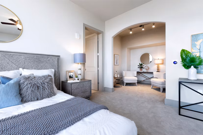 Modern bedroom with elegant furnishings at Ashton Austin Apartments