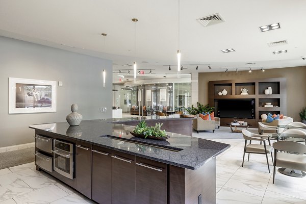 Spacious clubhouse with modern decor at Ashton Austin Apartments, ideal for social gatherings and events