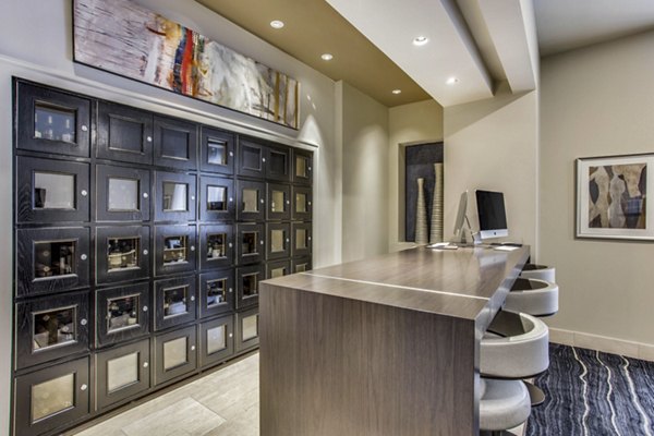 Clubhouse featuring modern design and entertainment areas at Ashton Austin Apartments
