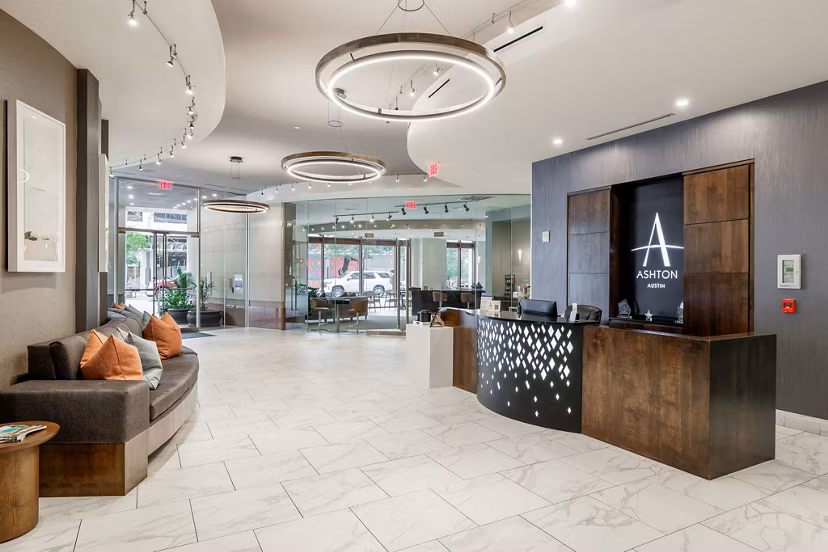 Clubhouse with modern furnishings at Ashton Austin Apartments featuring luxury amenities in vibrant downtown Austin