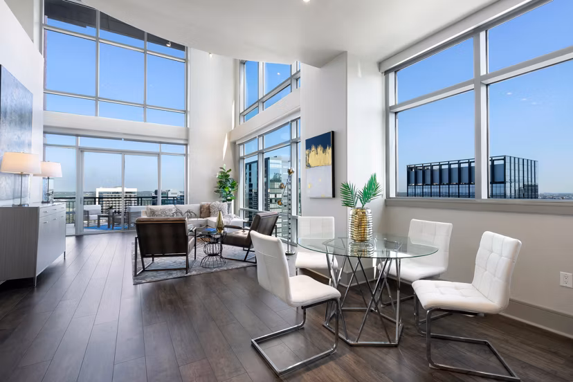 Modern clubhouse with plush seating and entertainment facilities at Ashton Austin Apartments