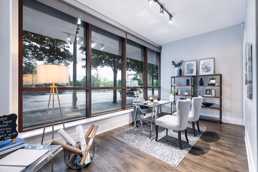 Elegant clubhouse with modern furnishings at Ashton Austin Apartments, ideal for events and social gatherings in a luxury community setting