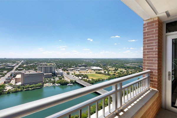 Patio with modern seating and greenery at Ashton Austin Apartments