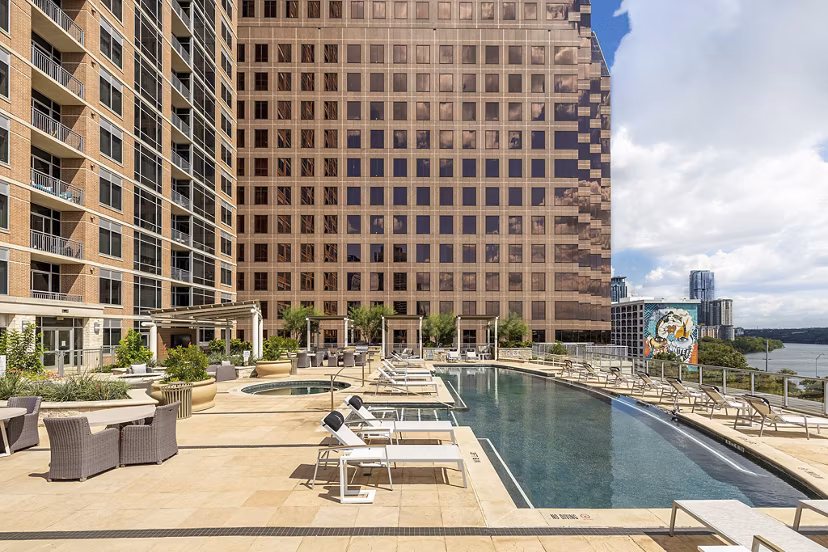 Luxurious pool area at Ashton Austin Apartments with city views