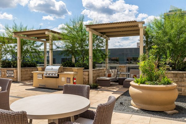 Spacious outdoor grill area with modern appliances at Ashton Austin Apartments frontline community living