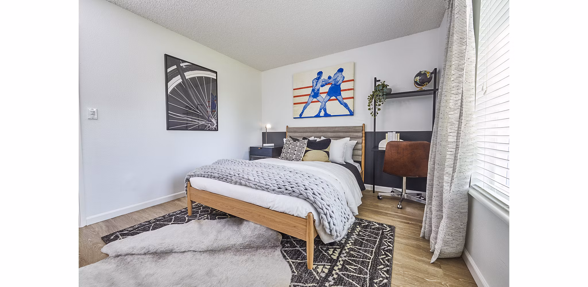 Spacious bedroom with modern decor and large windows at Greenwood Point Apartments, luxury living by Greystar