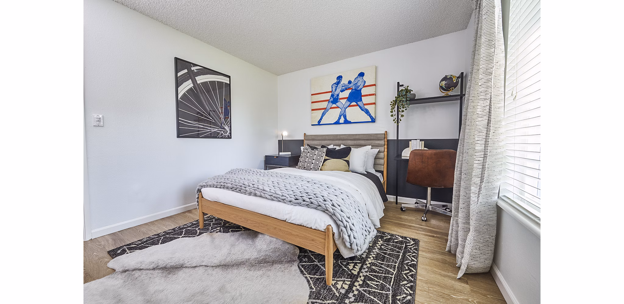 Spacious bedroom with modern decor and large windows at Greenwood Point Apartments, luxury living by Greystar