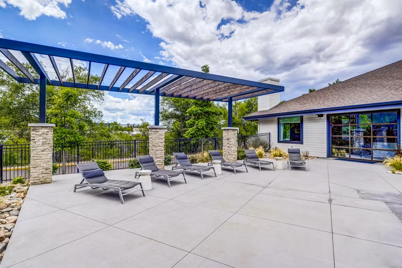 Spacious patio with modern outdoor seating at Greenwood Point Apartments