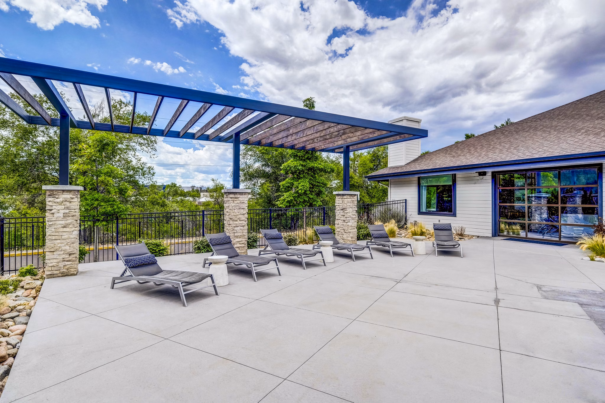 Spacious patio with modern outdoor seating at Greenwood Point Apartments