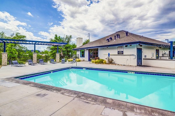 Resort-style pool with sundeck at Greenwood Point Apartments